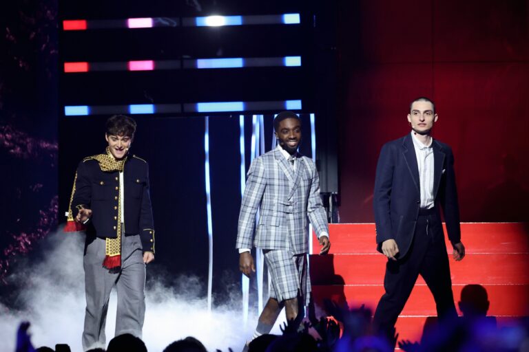 INGLEWOOD, CALIFORNIA - MAY 31: (L-R) Noah Schnapp, Caleb McLaughlin and Finn Wolfhard walk onstage during NETFLIX TUDUM 2025: THE LIVE EVENT at The Kia Forum on May 31, 2025 in Inglewood, California. (Photo by Amy Sussman/Getty Images for Netflix)