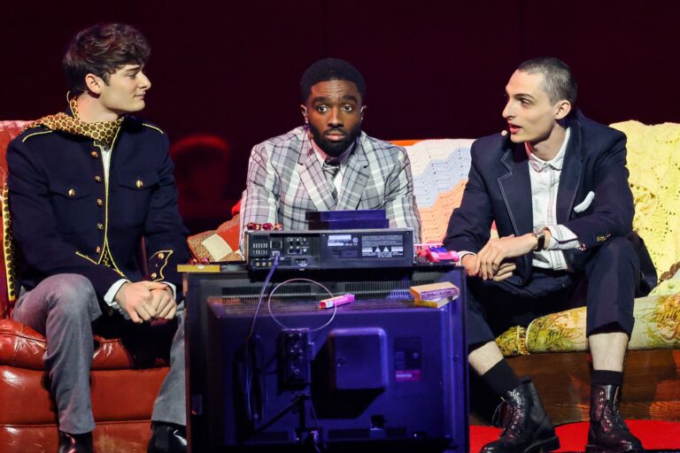 INGLEWOOD, CALIFORNIA - MAY 31: (L-R) Noah Schnapp, Caleb McLaughlin and Finn Wolfhard speak onstage during NETFLIX TUDUM 2025: THE LIVE EVENT at The Kia Forum on May 31, 2025 in Inglewood, California. (Photo by Amy Sussman/Getty Images for Netflix)
