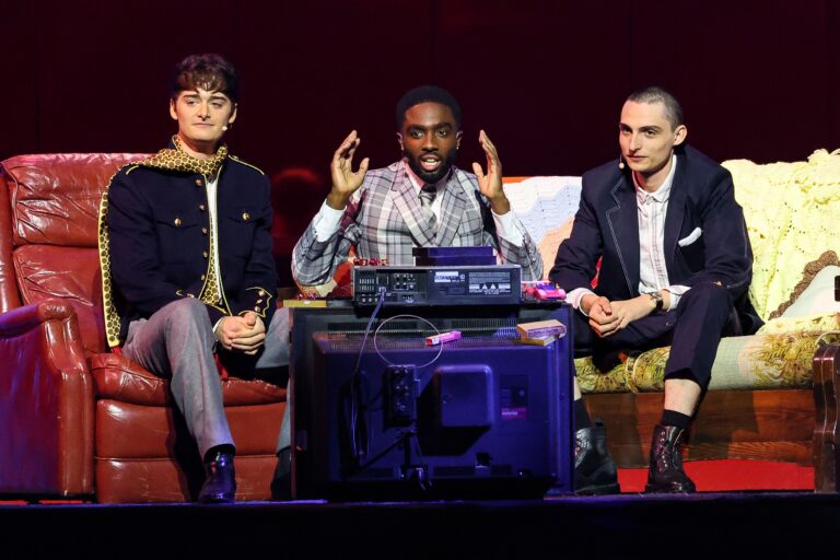 INGLEWOOD, CALIFORNIA - MAY 31: (L-R) Noah Schnapp, Caleb McLaughlin and Finn Wolfhard speak onstage during NETFLIX TUDUM 2025: THE LIVE EVENT at The Kia Forum on May 31, 2025 in Inglewood, California. (Photo by Amy Sussman/Getty Images for Netflix)