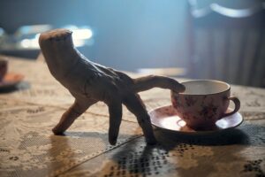 Wednesday. Thing in episode 201 of Wednesday. Cr. Helen Sloan/Netflix © 2025